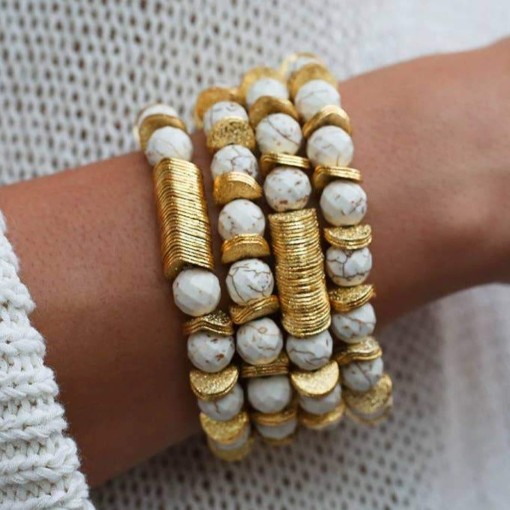 
            
                Load image into Gallery viewer, White Howlite Semi Precious Stone With Gold Discs Bracelet
            
        